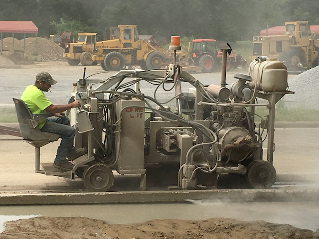 Jimmy Sawing a New Driveway Entrance