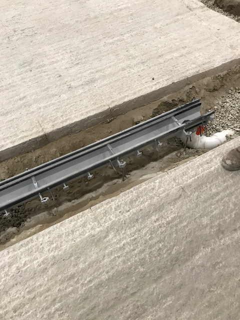 New trench drain in concrete slab